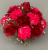 Cemetery pot with hot pink carnations and roses