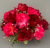 Cemetery pot with hot pink carnations and roses