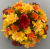 Cemetery pot with yellow & orange carnations